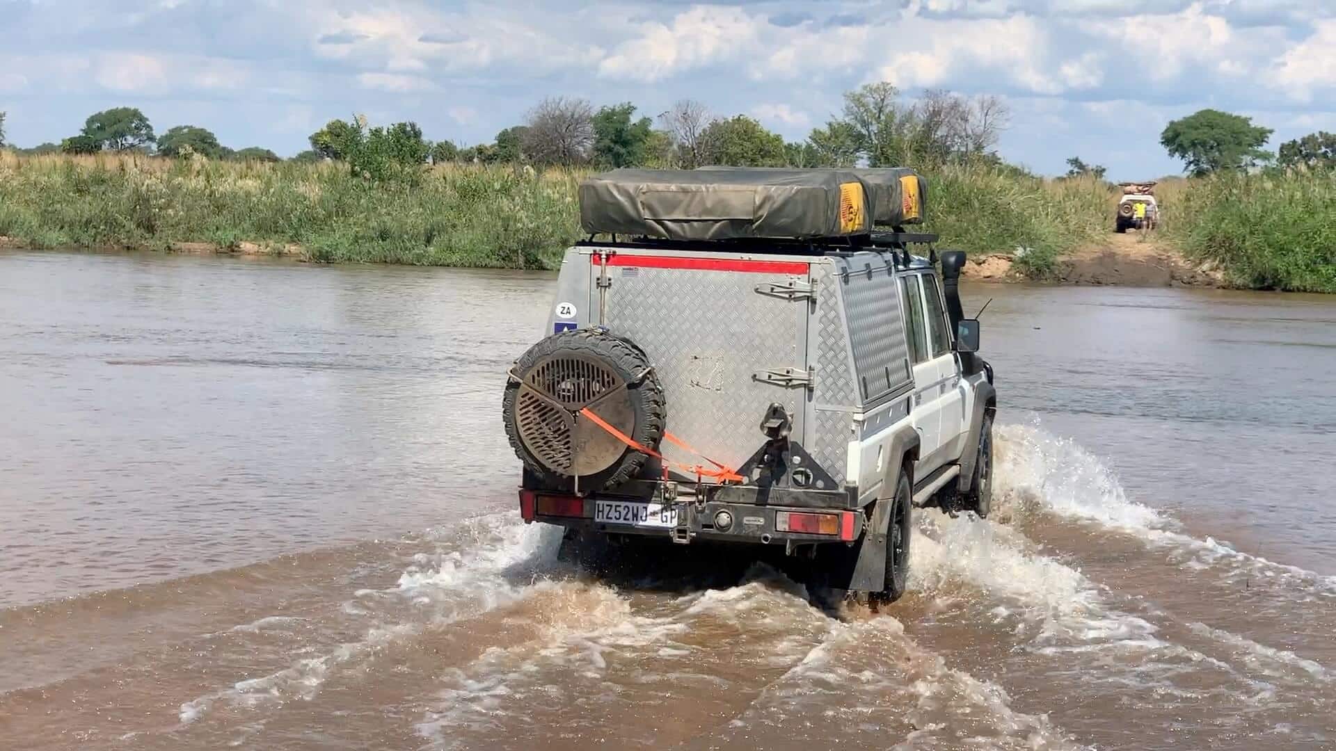 double cab land cruiser crossing river north luangwa african outback adventures